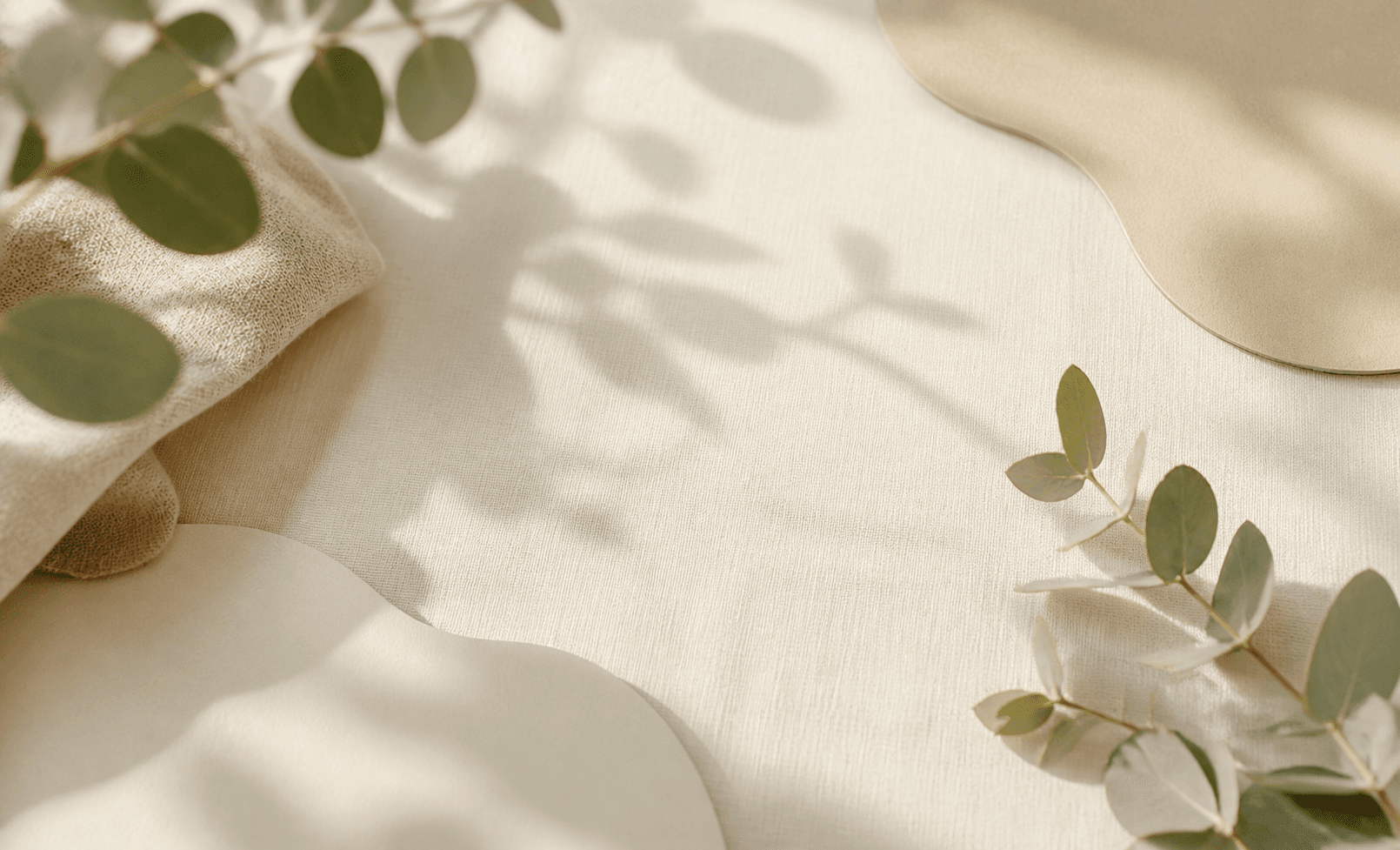 Soft cream linen texture with quiet botanical shadows